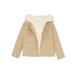 Woman wearing Yves Salomon shearling fur coat – luxury outerwear at Luxury Shoes 