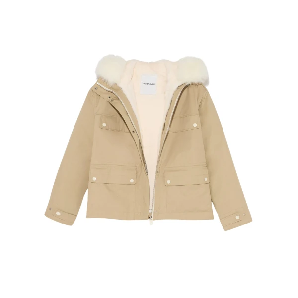 Woman wearing Yves Salomon shearling fur coat – luxury outerwear at Luxury Shoes 