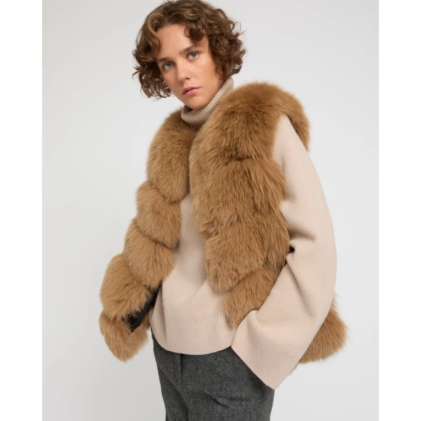 Woman wearing Yves Salomon shearling fur coat – luxury outerwear at Luxury Shoes 