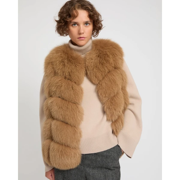 Woman wearing Yves Salomon shearling fur coat – luxury outerwear at Luxury Shoes 