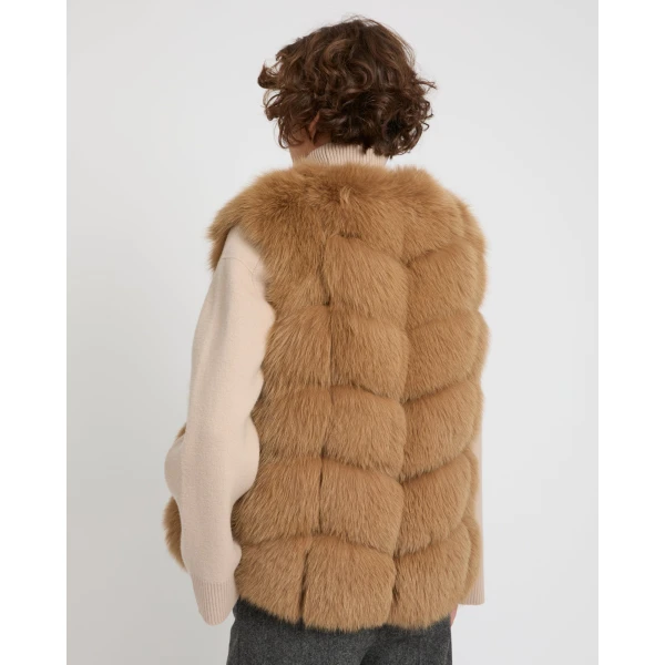 Woman wearing Yves Salomon shearling fur coat – luxury outerwear at Luxury Shoes 