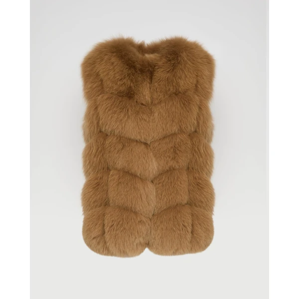 Woman wearing Yves Salomon shearling fur coat – luxury outerwear at Luxury Shoes 