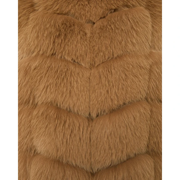Woman wearing Yves Salomon shearling fur coat – luxury outerwear at Luxury Shoes 