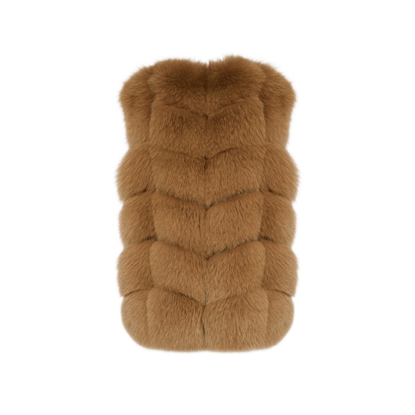 Woman wearing Yves Salomon shearling fur coat – luxury outerwear at Luxury Shoes 