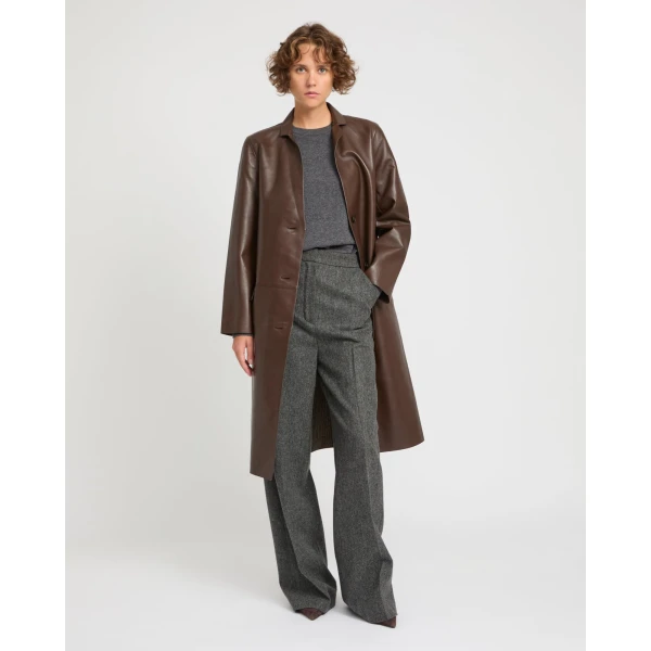 Woman wearing Yves Salomon shearling fur coat – luxury outerwear at Luxury Shoes 