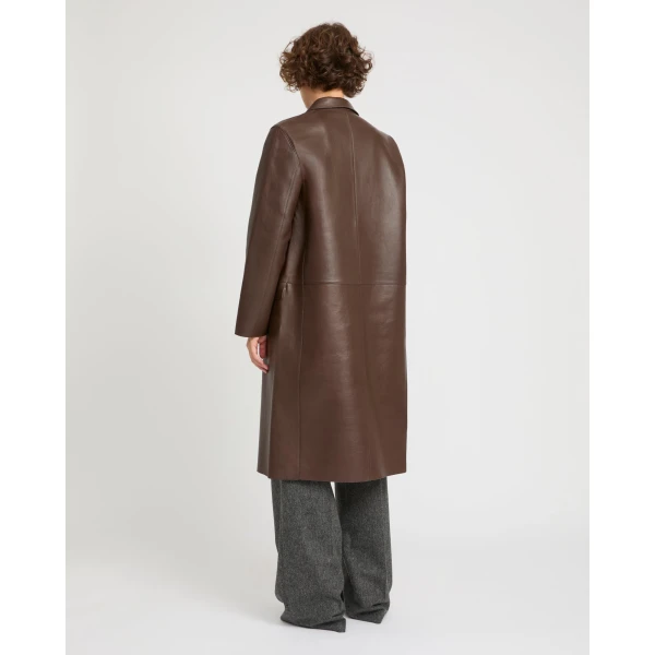 Woman wearing Yves Salomon shearling fur coat – luxury outerwear at Luxury Shoes 