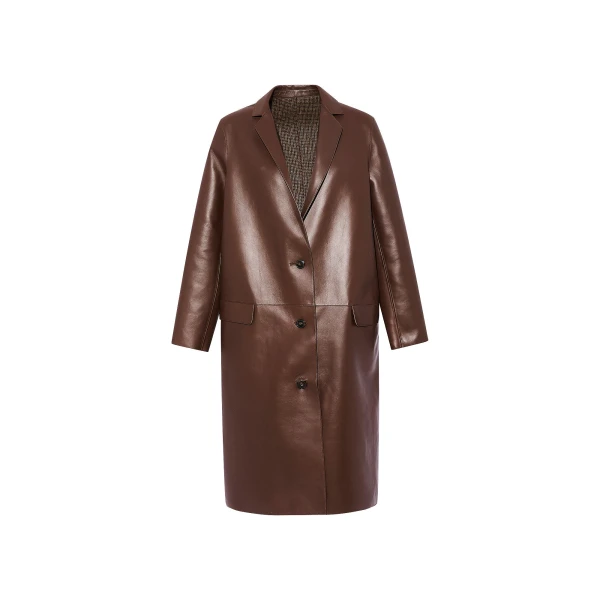 Woman wearing Yves Salomon shearling fur coat – luxury outerwear at Luxury Shoes 