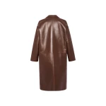 Woman wearing Yves Salomon shearling fur coat – luxury outerwear at Luxury Shoes 