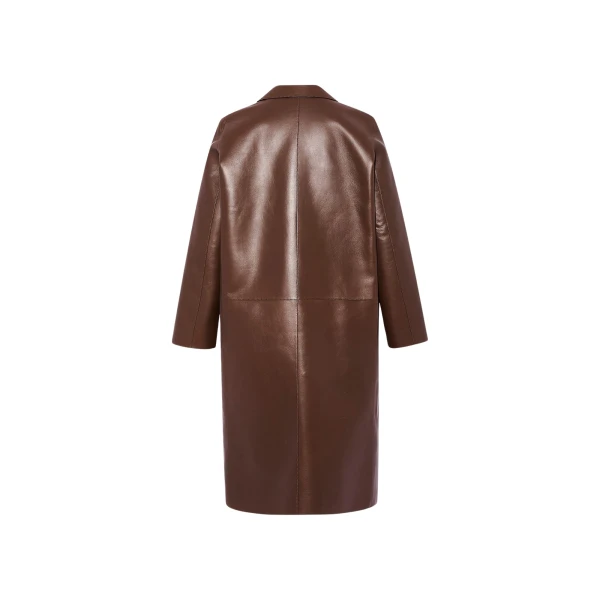Woman wearing Yves Salomon shearling fur coat – luxury outerwear at Luxury Shoes 