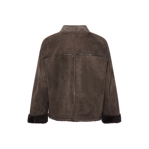 Woman wearing Yves Salomon shearling fur coat – luxury outerwear at Luxury Shoes 