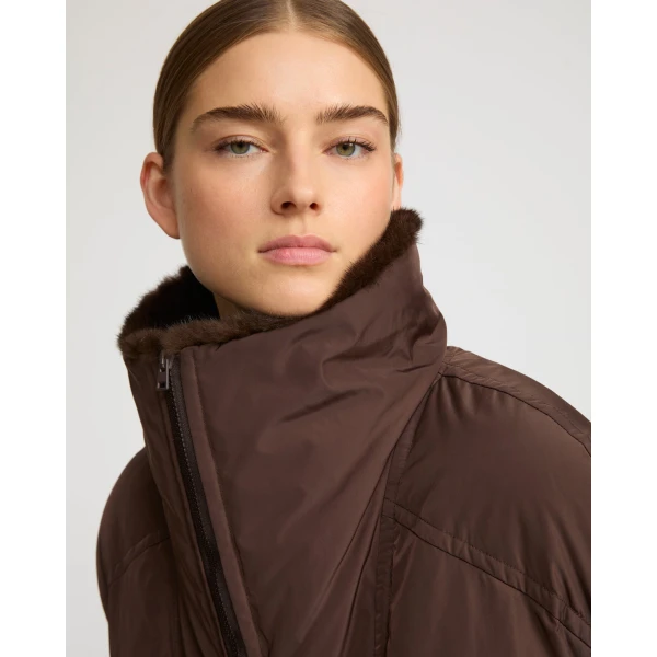 Woman wearing Yves Salomon shearling fur coat – luxury outerwear at Luxury Shoes 