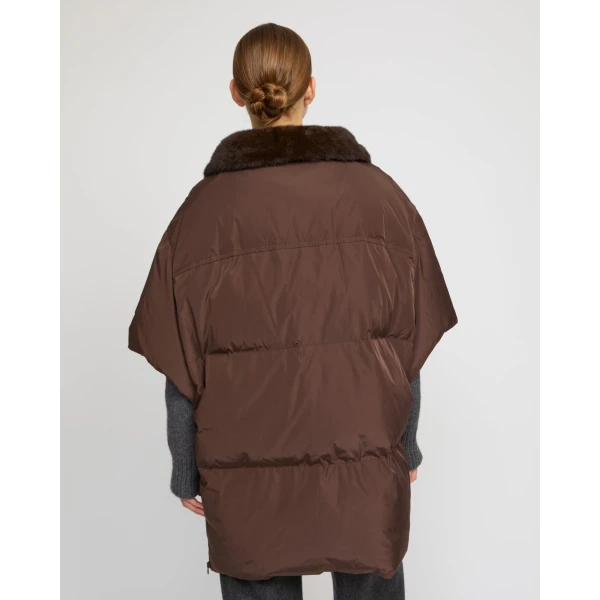 Woman wearing Yves Salomon shearling fur coat – luxury outerwear at Luxury Shoes 