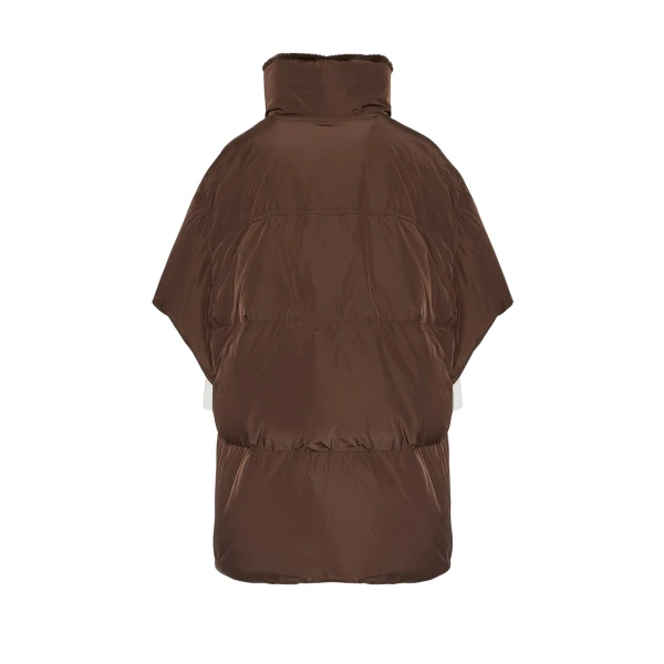 Woman wearing Yves Salomon shearling fur coat – luxury outerwear at Luxury Shoes 
