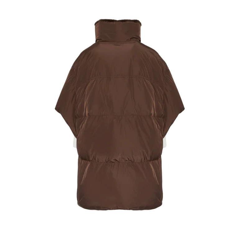 Woman wearing Yves Salomon shearling fur coat – luxury outerwear at Luxury Shoes 