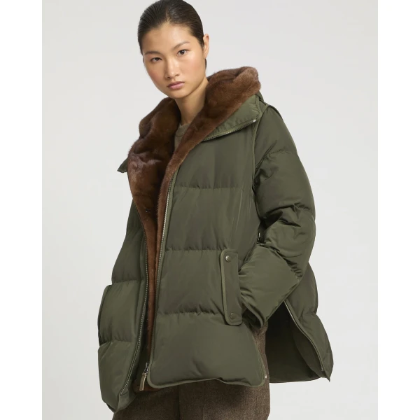 Woman wearing Yves Salomon shearling fur coat – luxury outerwear at Luxury Shoes 