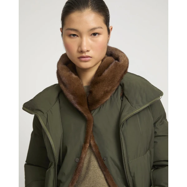 Woman wearing Yves Salomon shearling fur coat – luxury outerwear at Luxury Shoes 