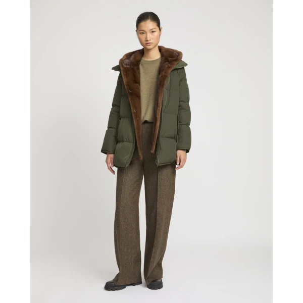 Woman wearing Yves Salomon shearling fur coat – luxury outerwear at Luxury Shoes 