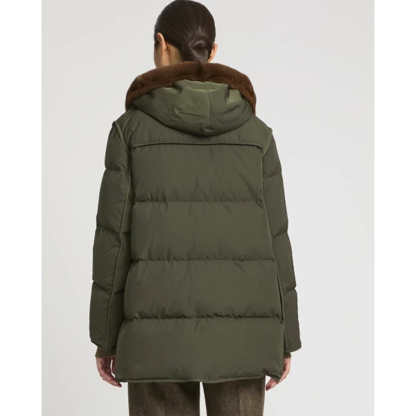 Woman wearing Yves Salomon shearling fur coat – luxury outerwear at Luxury Shoes 