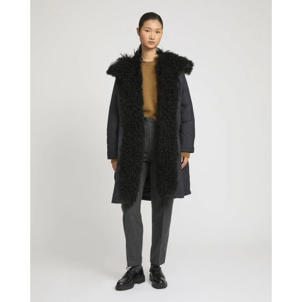 Woman wearing Yves Salomon shearling fur coat – luxury outerwear at Luxury Shoes 