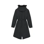 Woman wearing Yves Salomon shearling fur coat – luxury outerwear at Luxury Shoes 