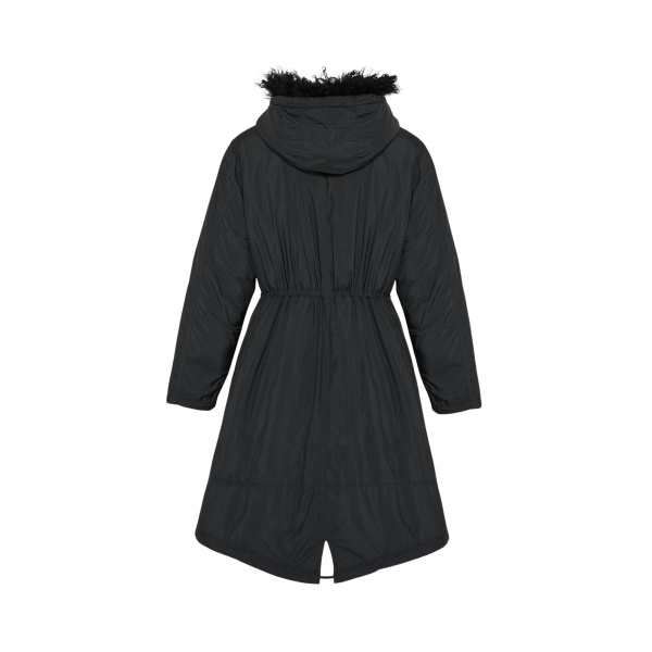 Woman wearing Yves Salomon shearling fur coat – luxury outerwear at Luxury Shoes 