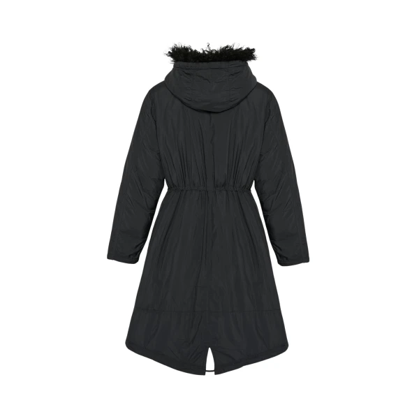 Woman wearing Yves Salomon shearling fur coat – luxury outerwear at Luxury Shoes 