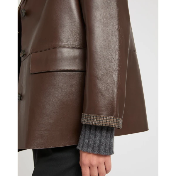 Woman wearing Yves Salomon shearling fur coat – luxury outerwear at Luxury Shoes 