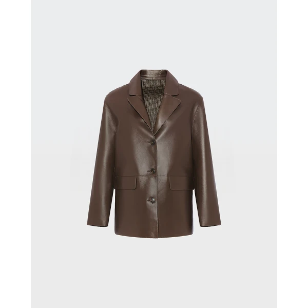 Woman wearing Yves Salomon shearling fur coat – luxury outerwear at Luxury Shoes 