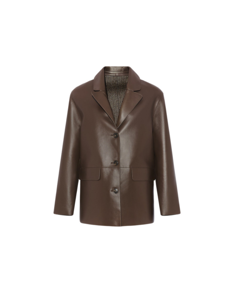 Woman wearing Yves Salomon shearling fur coat – luxury outerwear at Luxury Shoes 