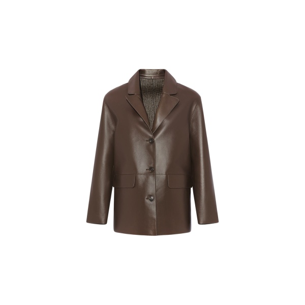Woman wearing Yves Salomon shearling fur coat – luxury outerwear at Luxury Shoes 