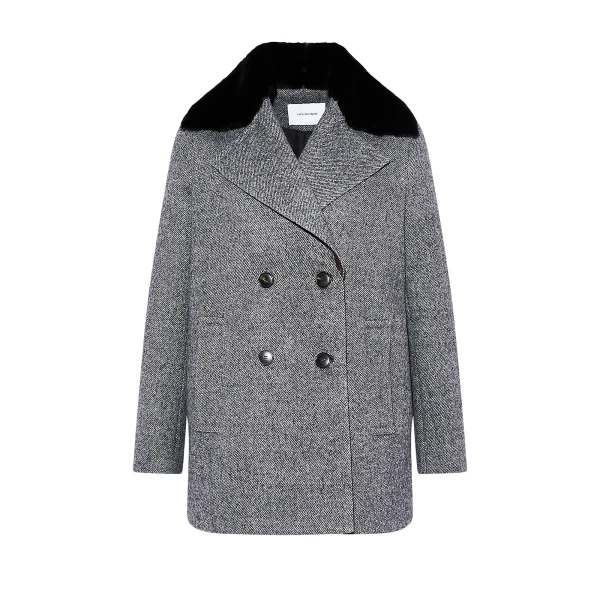 Woman wearing Yves Salomon shearling fur coat – luxury outerwear at Luxury Shoes 