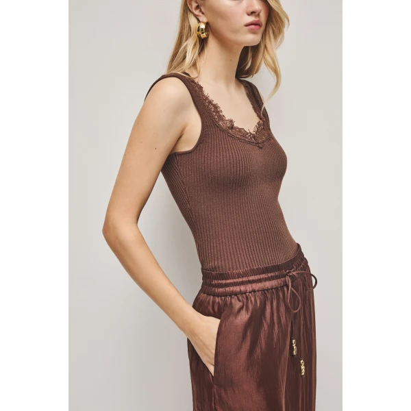 Aje Aus  – structured silhouette with raw femininity from Luxury Shoes 