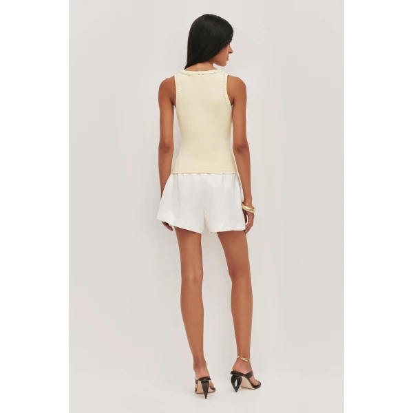 Aje Aus Tops – structured silhouette with raw femininity from Luxury Shoes 