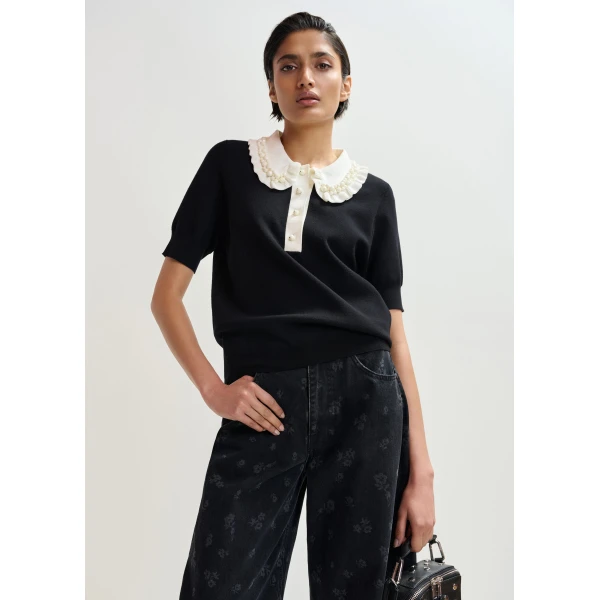 Essentiel Antwerp Black and off-white ruffle fine-knit polo top with bead embellishments - Essentiel Antwerp Tops - Colorful Belgian Design - Shop at Luxury Shoes 