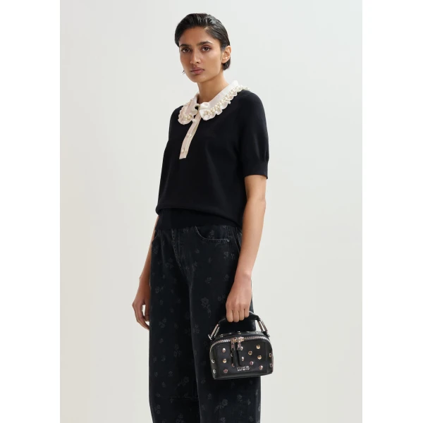 Essentiel Antwerp Black and off-white ruffle fine-knit polo top with bead embellishments - Essentiel Antwerp Tops - Colorful Belgian Design - Shop at Luxury Shoes 