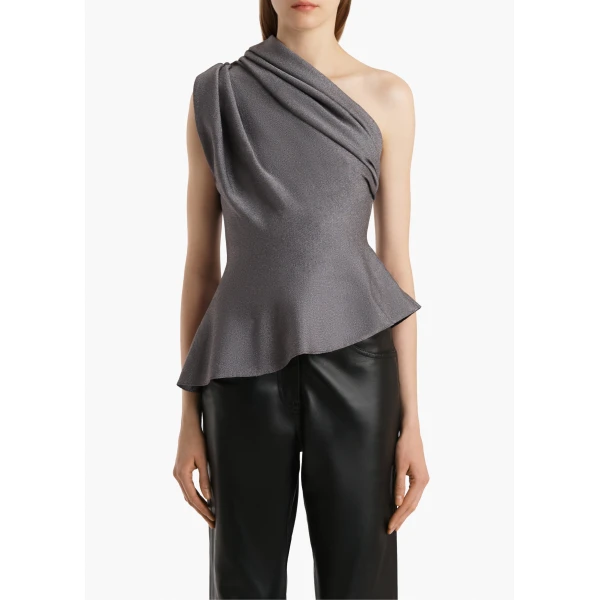 Elevate your elegance in this Khaite Tops   from the 2025 resort wear edit