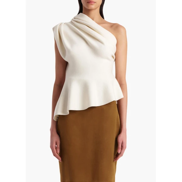Elevate your elegance in this Khaite Tops   from the 2025 resort wear edit
