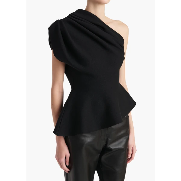 Elevate your elegance in this Khaite Tops   from the 2025 resort wear edit