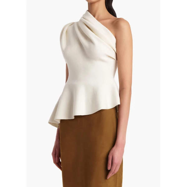 Elevate your elegance in this Khaite Tops   from the 2025 resort wear edit