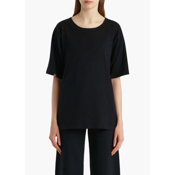Elevate your elegance in this Khaite Tops   from the 2025 resort wear edit