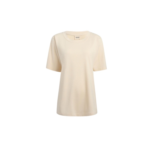 Elevate your elegance in this Khaite Tops   from the 2025 resort wear edit