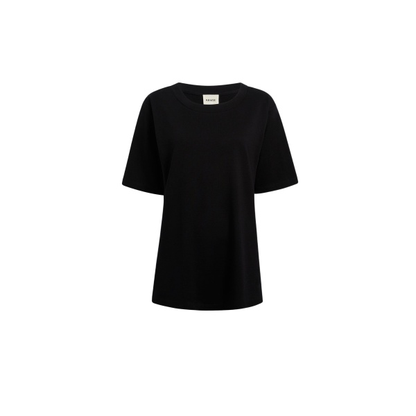 Elevate your elegance in this Khaite Tops   from the 2025 resort wear edit
