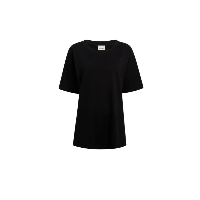 Elevate your elegance in this Khaite Tops   from the 2025 resort wear edit