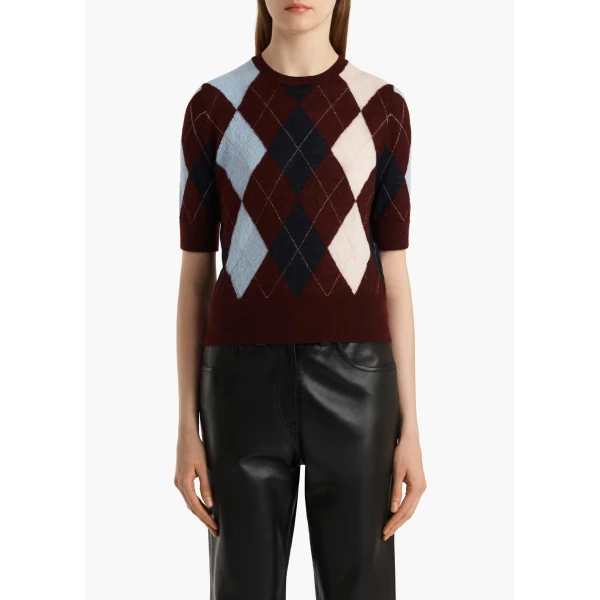 Elevate your elegance in this Khaite Tops   from the 2025 resort wear edit