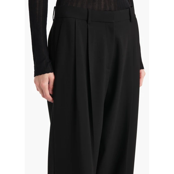 Elevate your elegance in this Khaite Pants   from the 2025 resort wear edit
