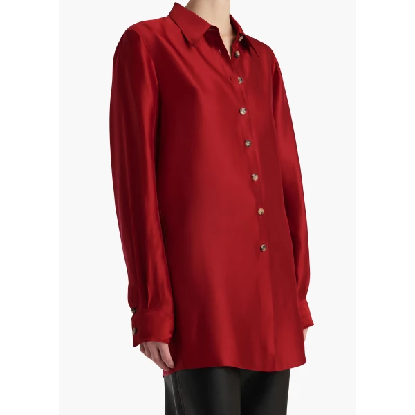 Elevate your elegance in this Khaite Tops   from the 2025 resort wear edit