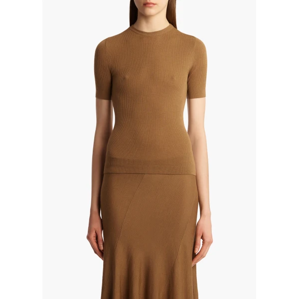 Elevate your elegance in this Khaite Tops   from the 2025 resort wear edit