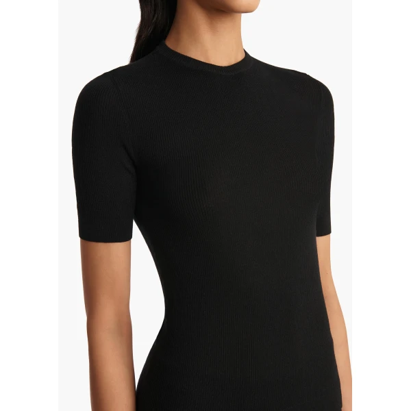 Elevate your elegance in this Khaite Tops   from the 2025 resort wear edit