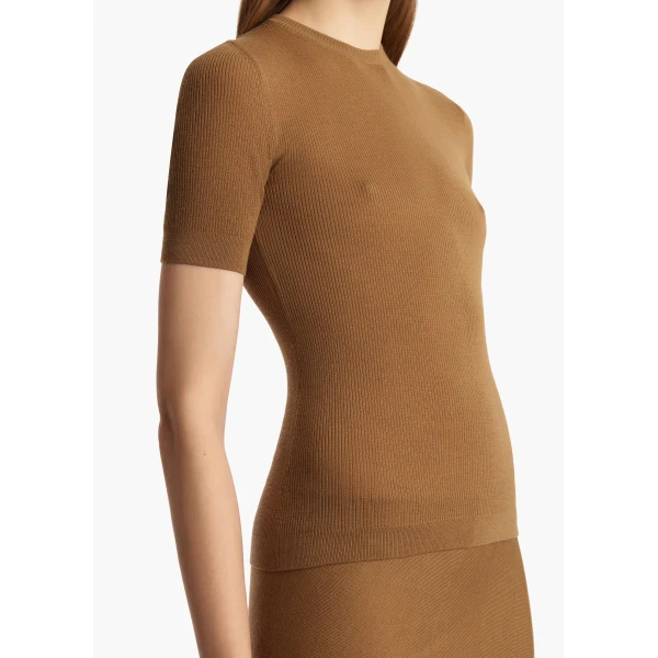Elevate your elegance in this Khaite Tops   from the 2025 resort wear edit