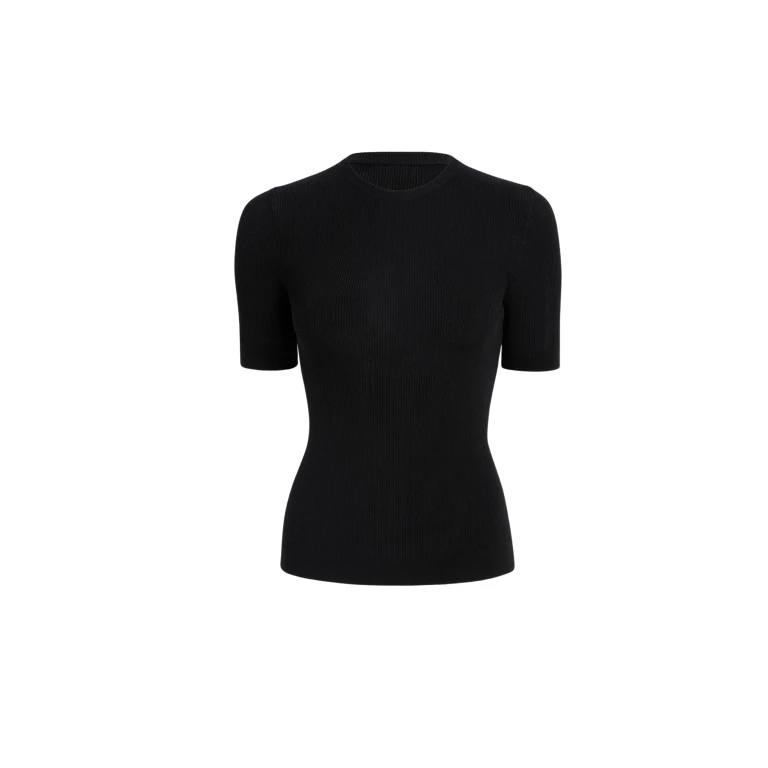 Elevate your elegance in this Khaite Tops   from the 2025 resort wear edit